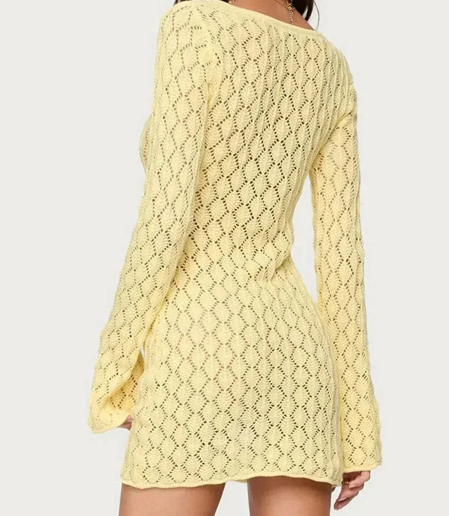 Back view of yellow crochet mini dress with open-knit pattern and long sleeves
