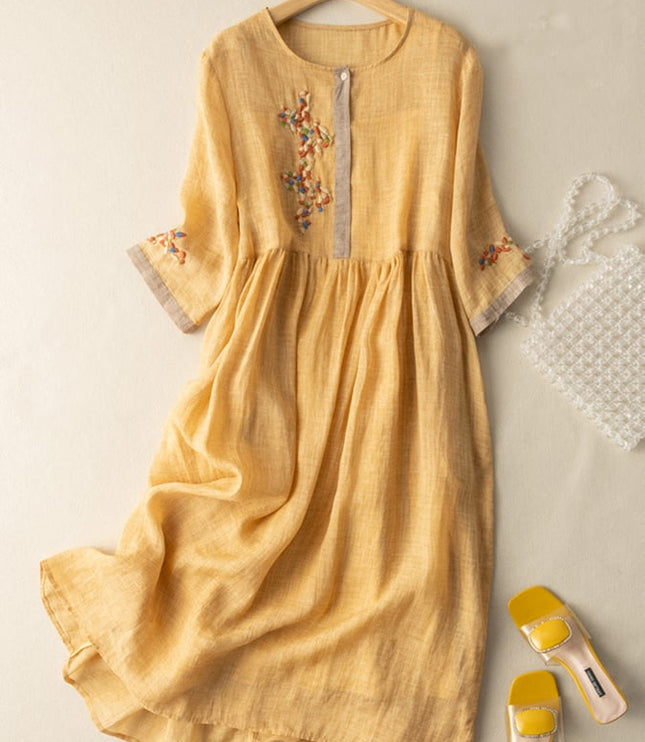 Mustard yellow women's summer embroidered midi dress with 3/4 sleeves and floral detail