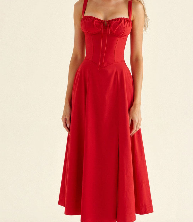 Front view of a red summer midi dress with a corset bodice and side split detail.