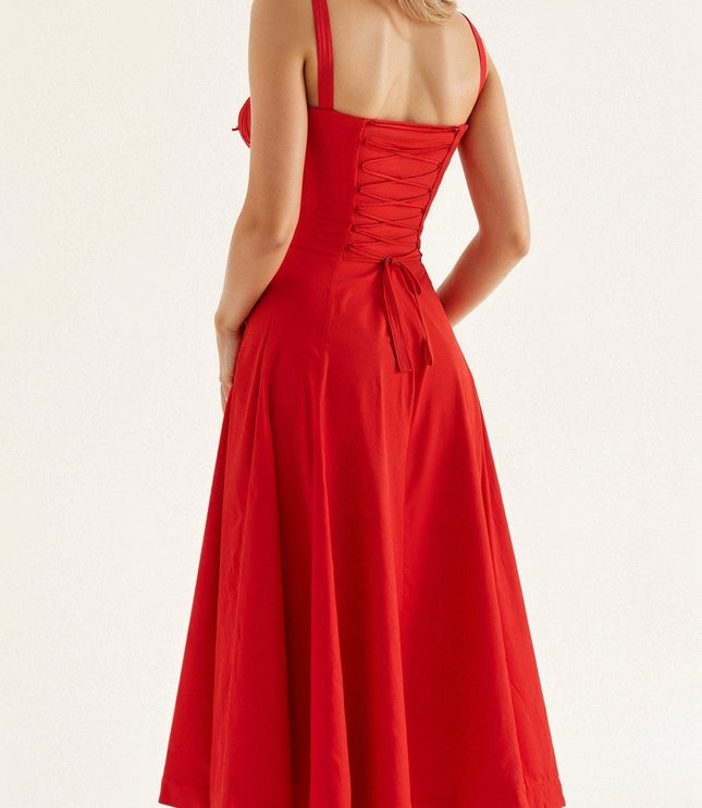 Back view of a red summer midi dress with lace-up corset detail and a flowing skirt.
