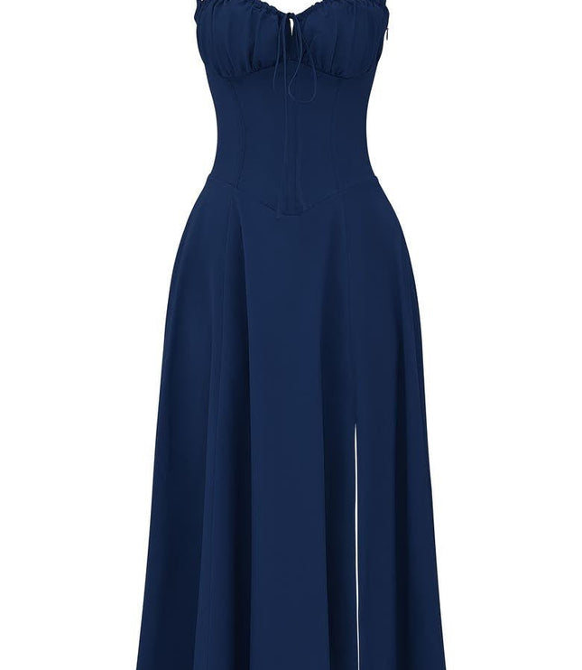 Flat lay of a navy blue midi dress with a structured corset bodice, tie-front, and a side split.