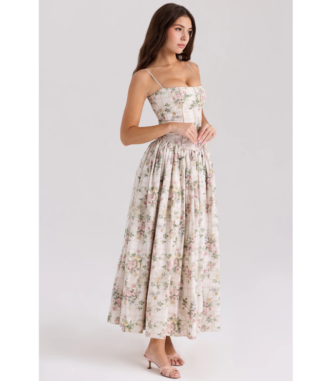 Floral maxi dress with square neckline, straps, and softly pleated skirt