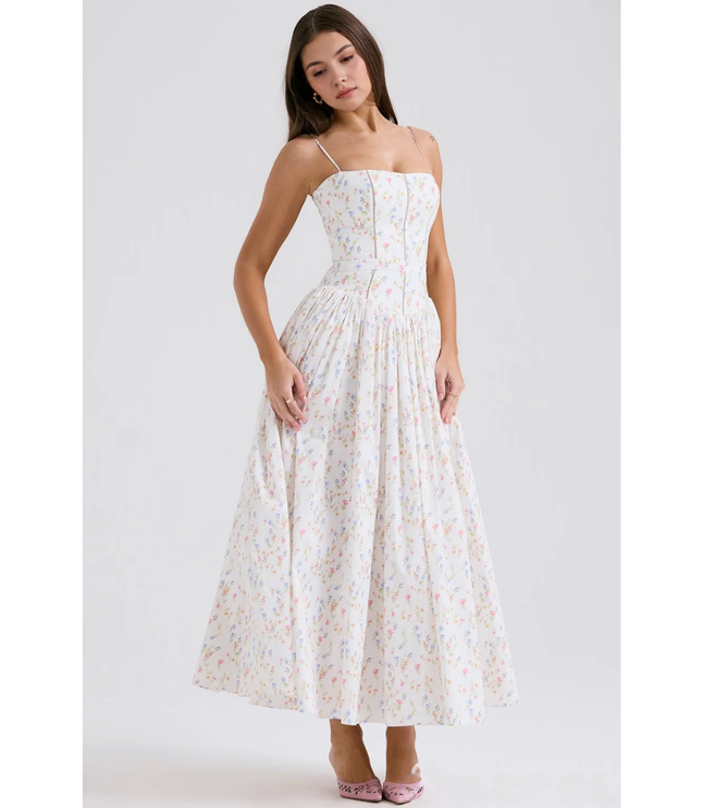 Front view of pastel floral summer dress with fitted bodice and wide maxi skirt