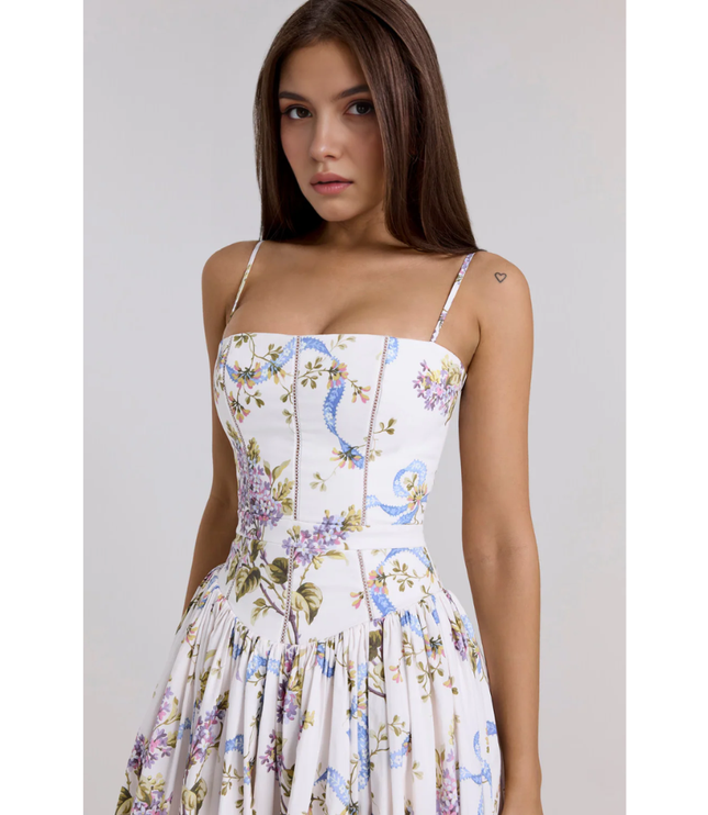 Front view of women's floral maxi dress with high slit, fitted bodice, and lightweight skirt