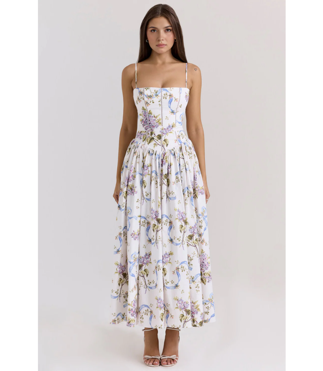 Women's floral maxi dress with spaghetti straps, fitted bodice, and full skirt in white