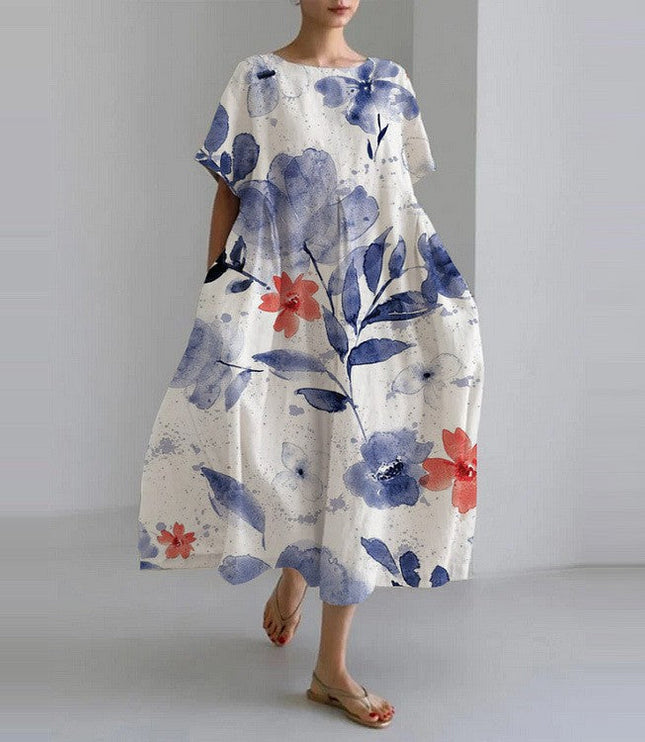 White midi dress with blue watercolor flowers and red accents, flowy summer dress