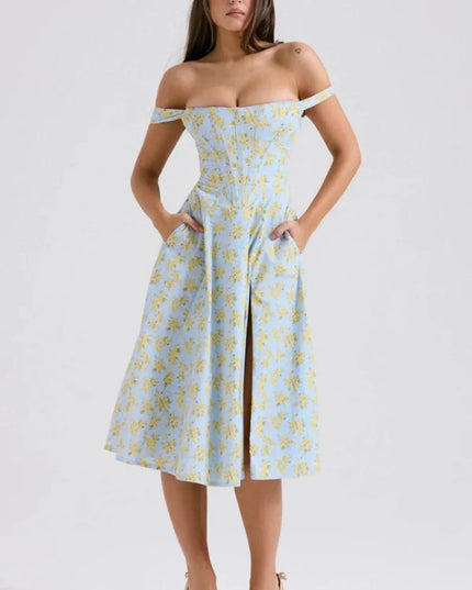 Front view of a blue floral off shoulder midi dress with slit and pockets