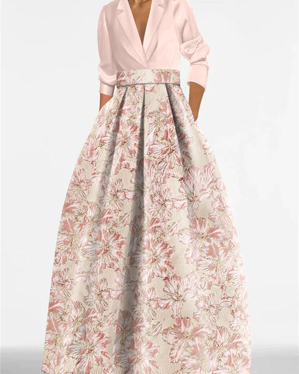Detail view of waistband and pleated skirt on floral mother of bride dress