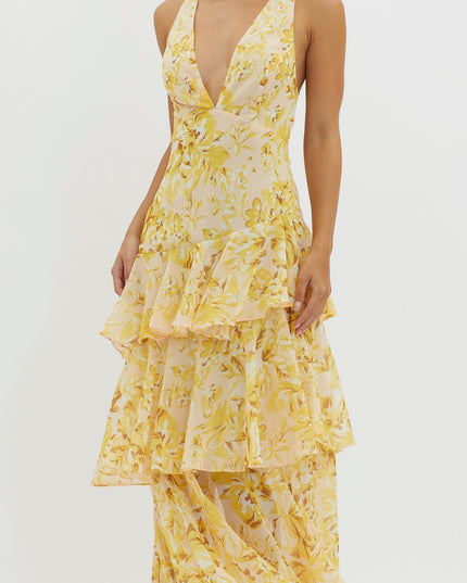 Close-up side view of yellow floral midi dress ruffled details