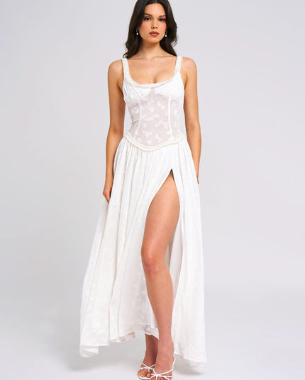 White sleeveless sundress with embroidered fitted bodice and high slit front