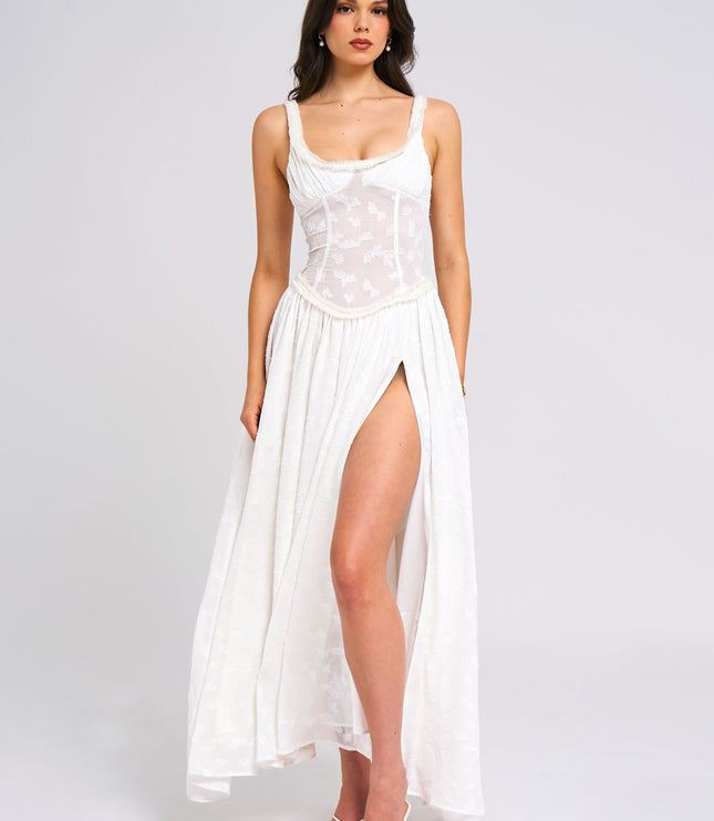 White sleeveless sundress with embroidered fitted bodice and high slit front