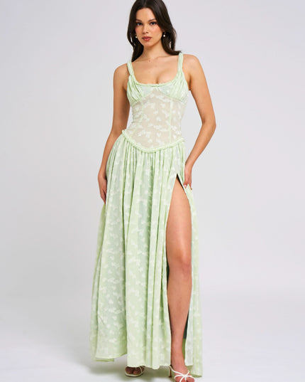 Sleeveless scoop neck maxi dress in pale green floral print with gathered skirt