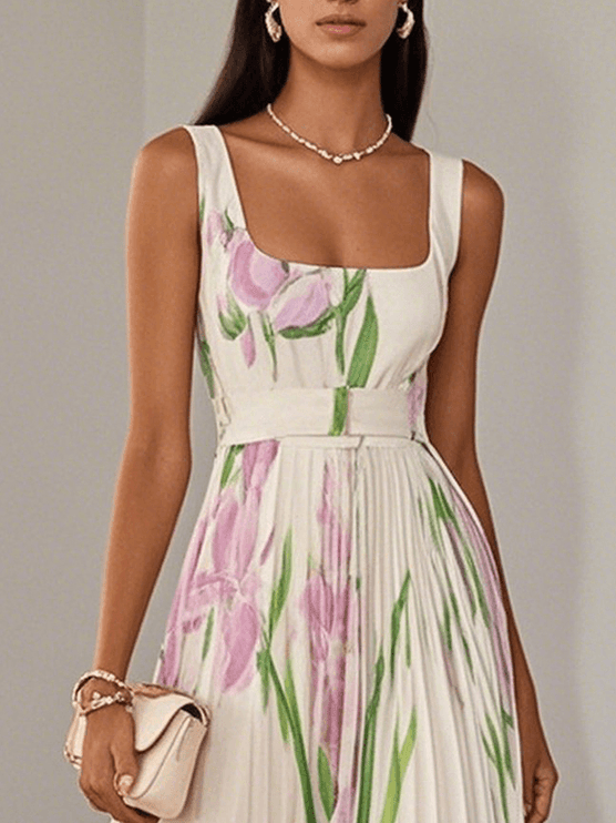 Close-up of floral sleeveless maxi dress with square neckline, waist band and pink flower print
