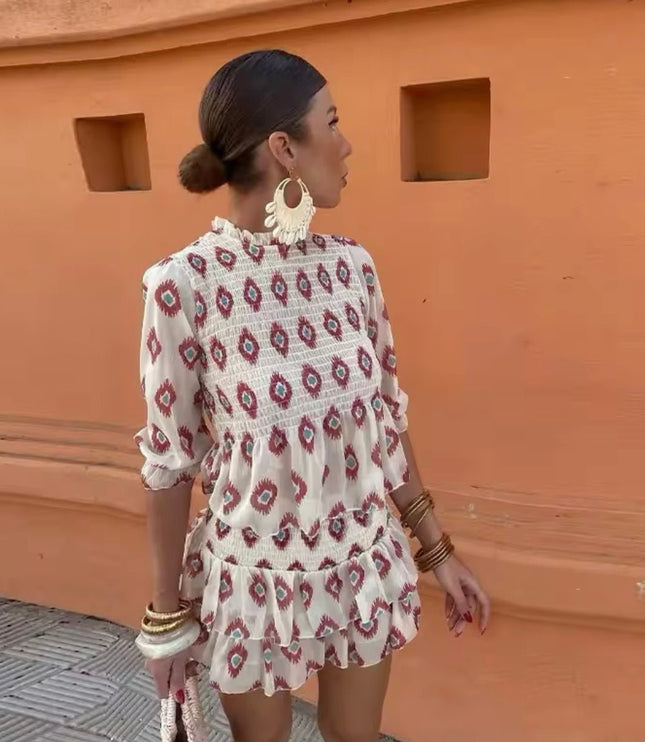 Women's summer floral mini dress with long sleeves and ruffled hem, back view