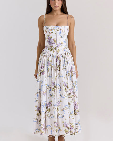 Full length white floral spaghetti strap midi dress with purple and blue flower and ribbon print.