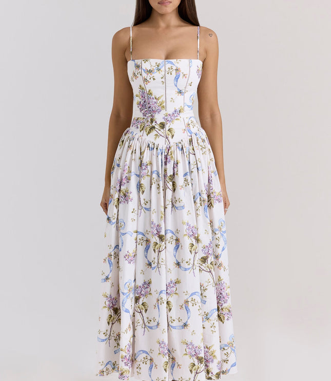 Full length white floral spaghetti strap midi dress with purple and blue flower and ribbon print.