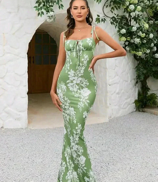 Green floral square neck maxi dress with tie straps and ruched bust in a fitted summer style
