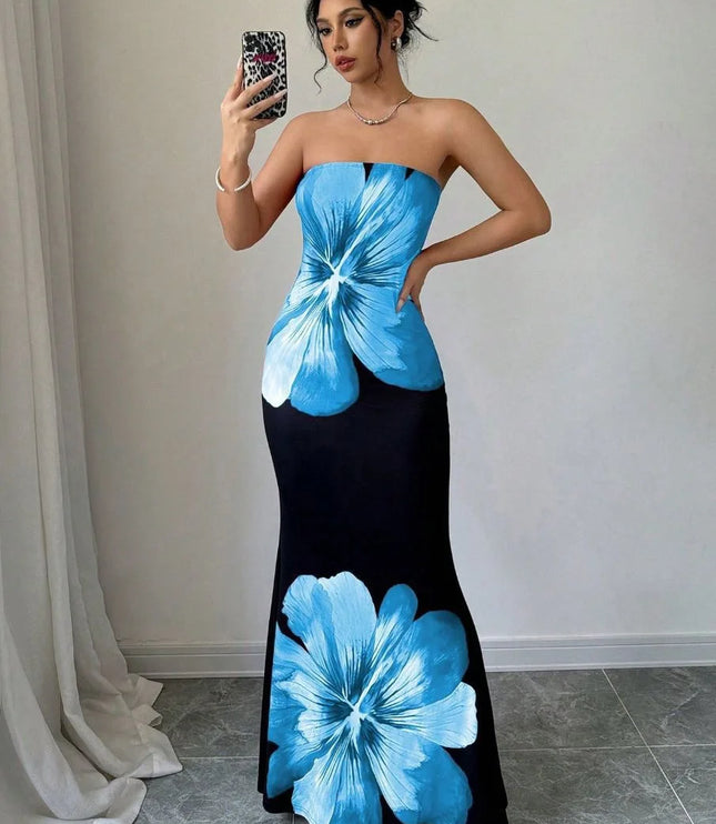 Woman wearing blue floral strapless maxi dress with black skirt and large flower print