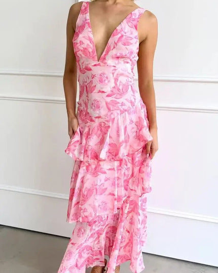 Pink floral V neck maxi dress with sleeveless straps, ruffle tiers, and sheer hem