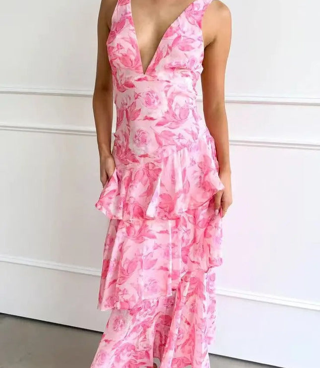 Pink floral V neck maxi dress with sleeveless straps, ruffle tiers, and sheer hem