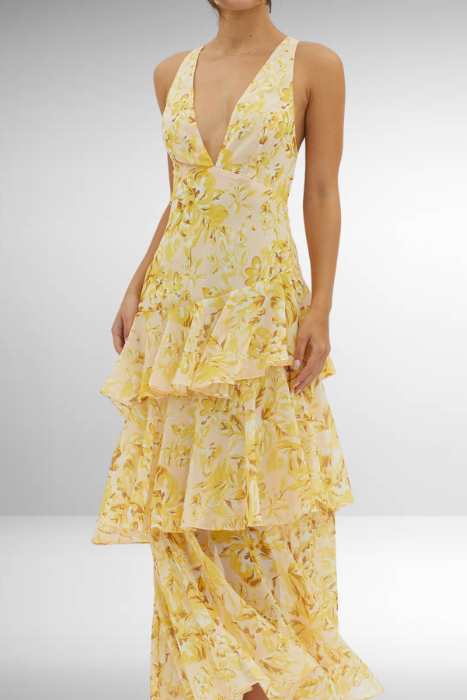 Close view of yellow floral V neck maxi dress with ruffled tiered skirt and sleeveless top