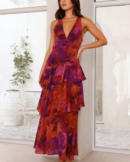 Front view of magenta and orange floral V neck maxi dress with tiered ruffle layers