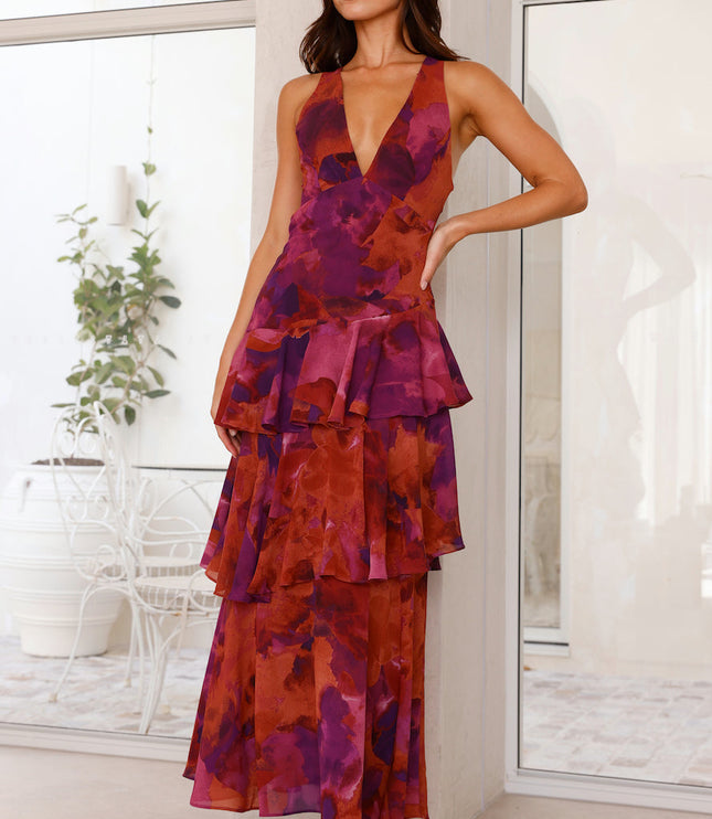 Front view of magenta and orange floral V neck maxi dress with tiered ruffle layers