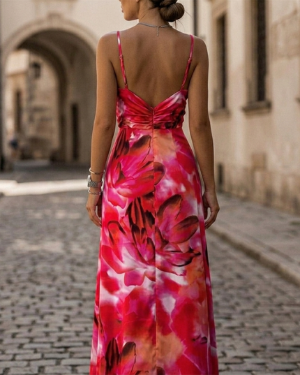 Back view of women's floral maxi dress with straps and open low back