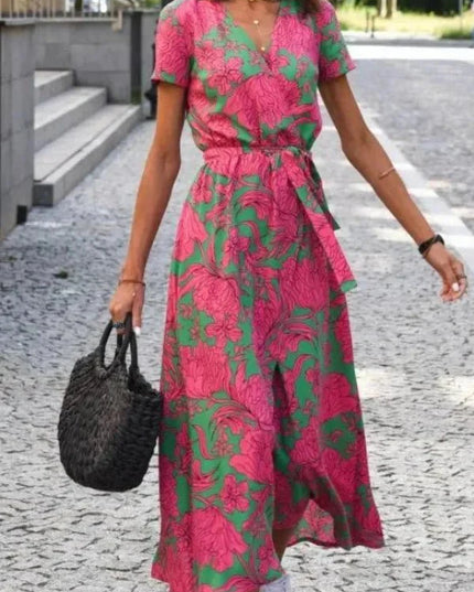 Women's summer floral V neck midi dress with pink and green print, short sleeves, and tie waist