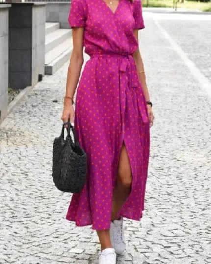 Women's magenta polka dot V neck midi dress with short sleeves, tie waist and front slit
