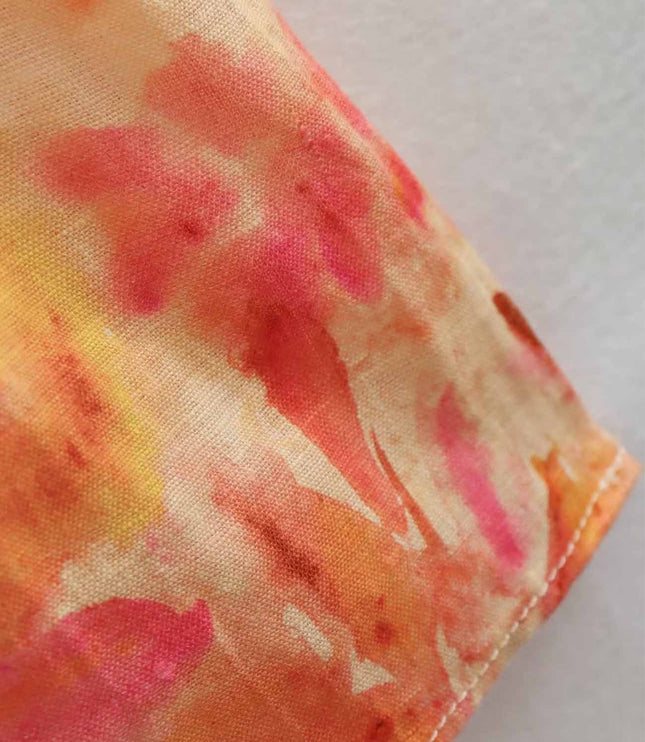 Floral maxi dress sleeve hem in orange, pink and yellow with stitched edge detail