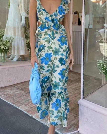 Blue floral V neck maxi dress with ruffle sleeves and side cutouts, full length view