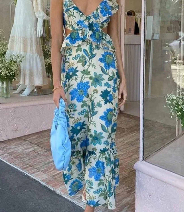 Blue floral V neck maxi dress with ruffle sleeves and side cutouts, full length view
