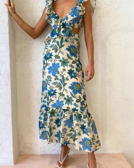 Blue floral V neck maxi dress with layered ruffle bodice and flounced hem, angled view