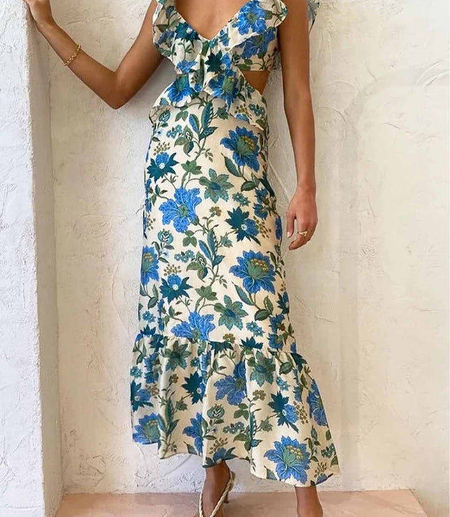 Blue floral V neck maxi dress with layered ruffle bodice and flounced hem, angled view