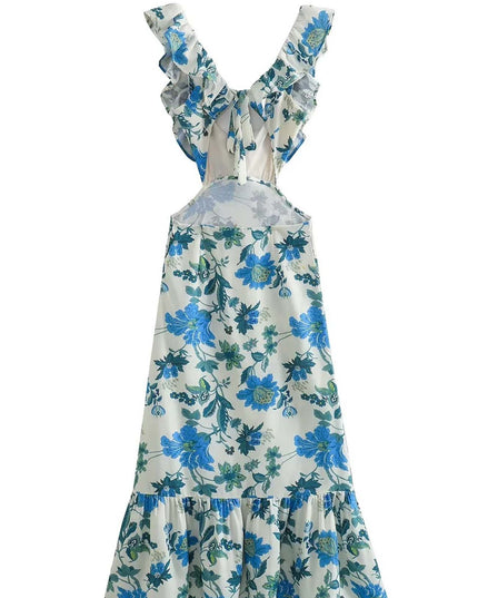 Back of blue floral V neck maxi dress showing open back and tie detail on white