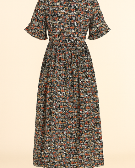 Back view of black floral midi dress showing gathered waist and flutter sleeves