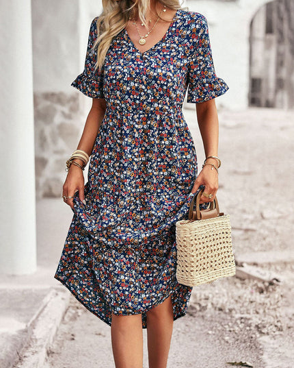 Navy blue floral midi dress with v-neckline and short sleeves