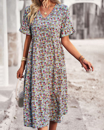 Light blue multicolor floral midi dress with short sleeves and v-neckline