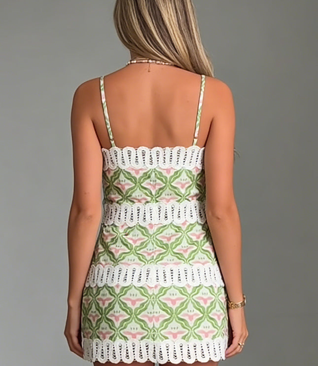 Back view of floral mini sundress with white eyelet lace bands