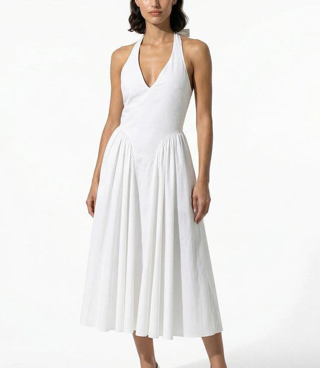 Black halter midi dress from the back with zipper closure and gathered skirt