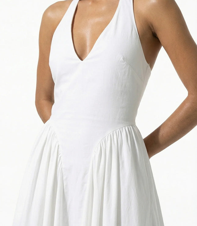 White halter midi dress with deep V neckline and flared skirt, front view