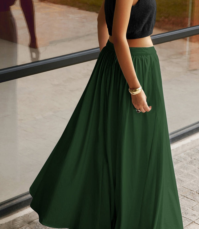 Back view of black pleated maxi skirt with high waistband and long flowing hem
