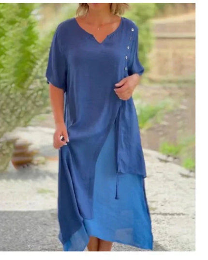 Navy blue layered v-neck midi dress with flowing asymmetrical hem