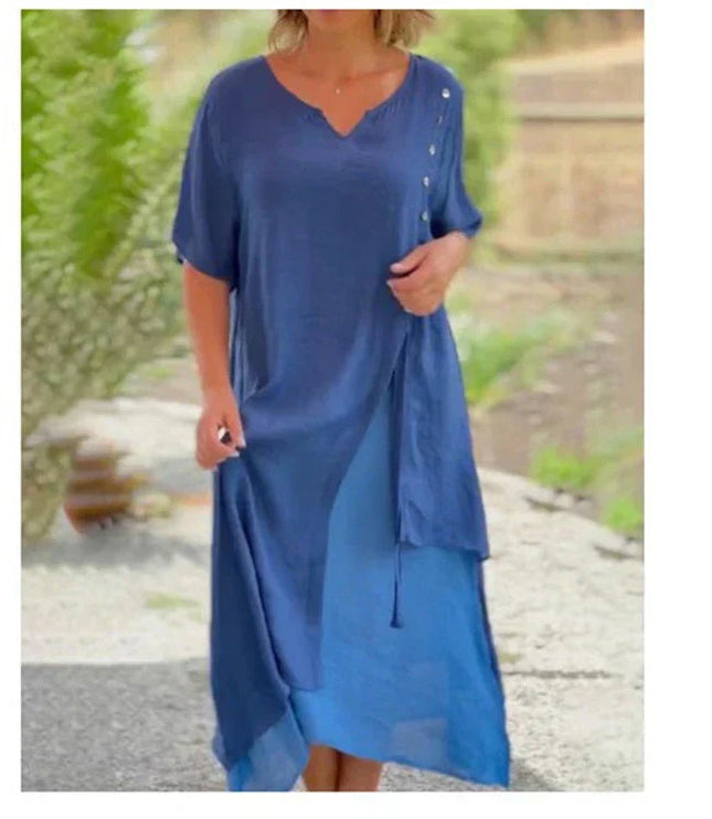 Navy blue layered v-neck midi dress with flowing asymmetrical hem