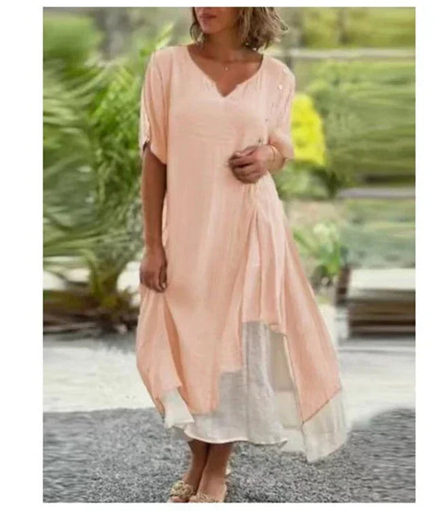 Peach and cream layered v-neck midi dress with soft flowing layers