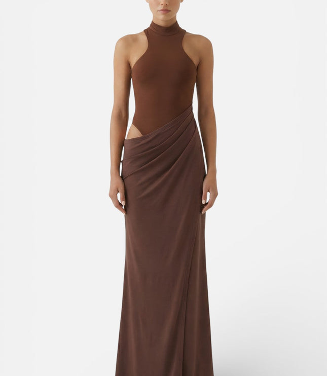 Front view of brown halter cut out maxi dress with fitted bodice and long skirt