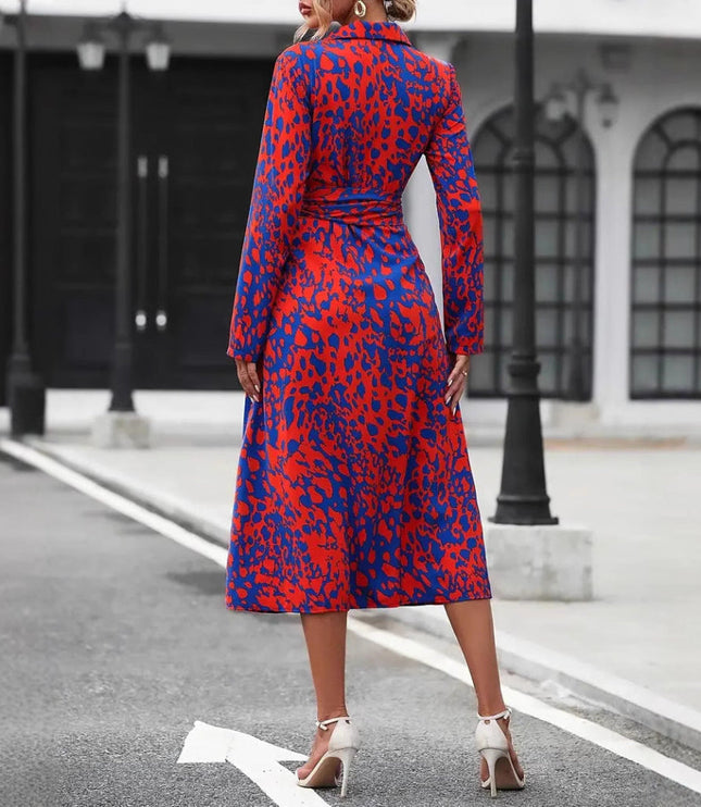 Back view of red and blue leopard print wrap midi dress with slit hem