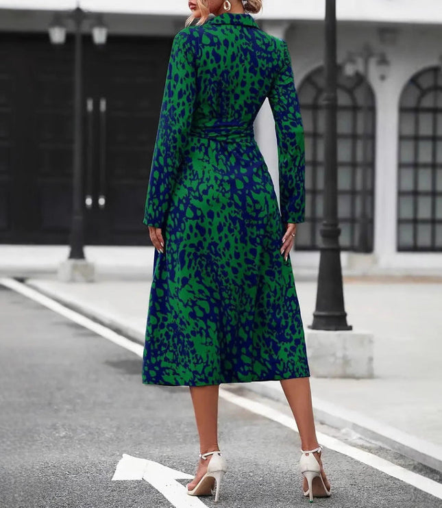 Back view of green and navy leopard print wrap midi dress showing slit