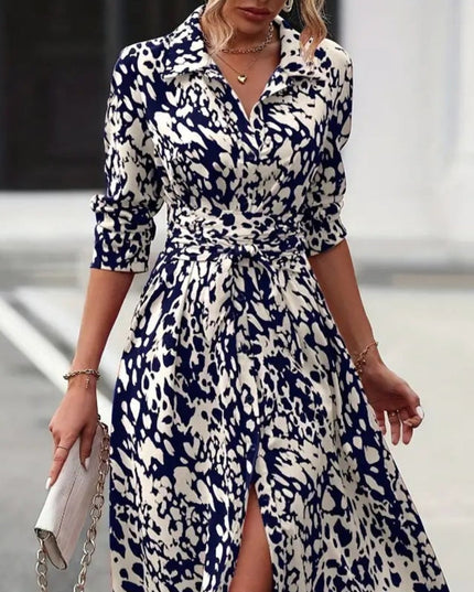 Navy and cream leopard print wrap midi dress with half sleeves and tie closure
